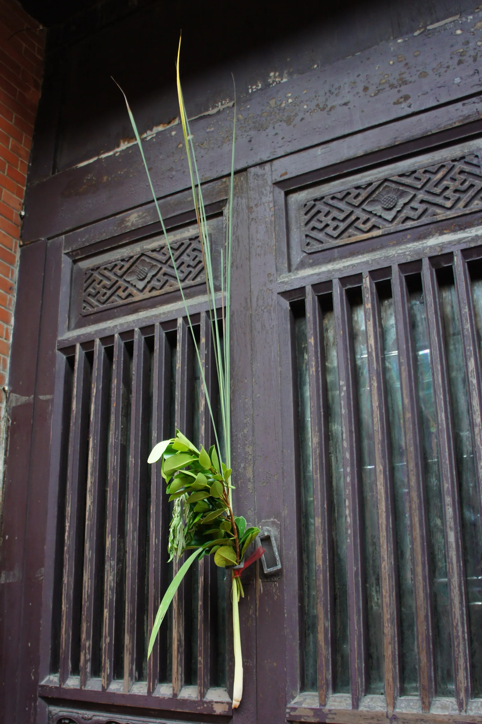 Plants hung at the door during Dragon Boat Festival to ward off evil