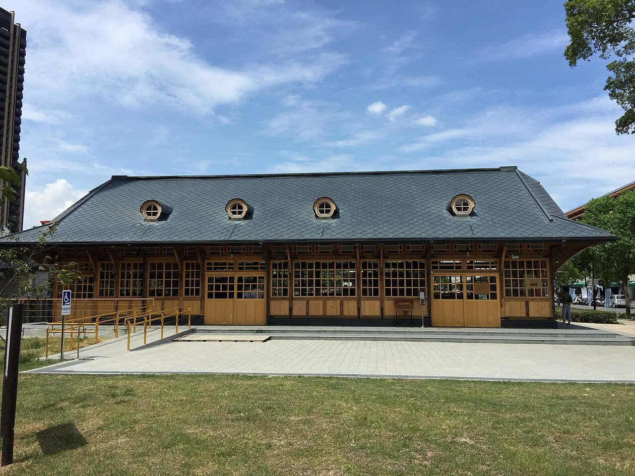 Xinbeitou Station, opened in 1916 and reassembled in Qixing Park in 2017, built of Taiwanese hinoki cypress with four round dormer-window openings