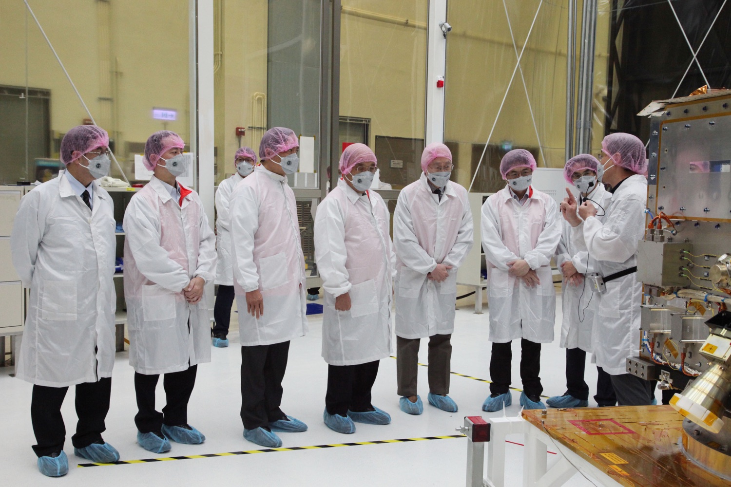 Triton satellite integration and testing in the space center clean room. This first Taiwanese-made weather satellite was originally the thirteenth satellite of the U.S.-Taiwan FORMOSAT-7 program before being spun off independently. Its domestic content rose above 80 percent, and it uses GNSS reflected signals to measure ocean surface wind speed.